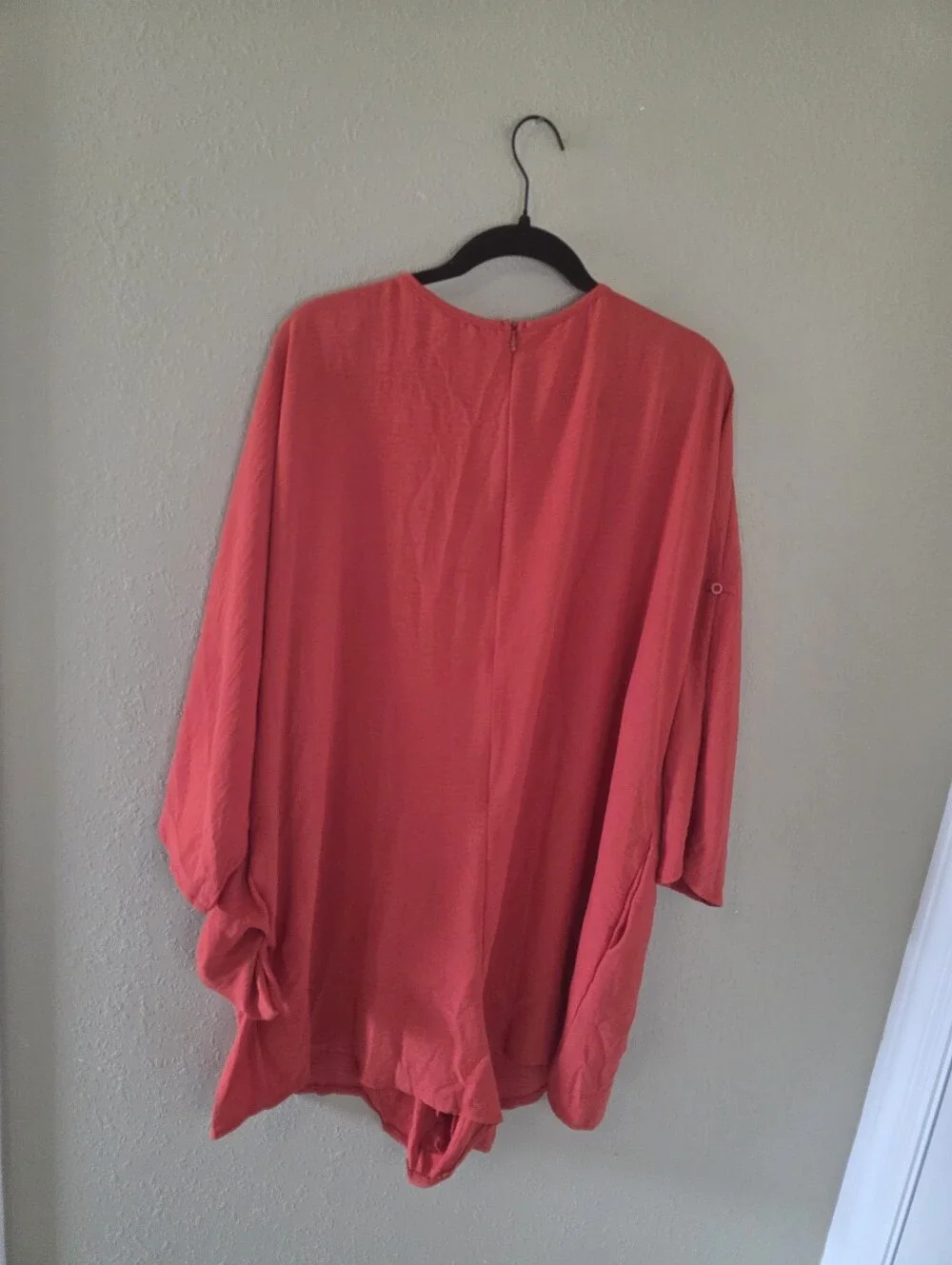 Orange Women’s Romper. V-Neck Textured. Hidden Zipper On Back.